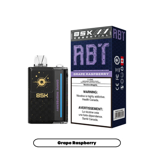 ABT 85K Grape Raspberry disposable vape device with a black celestial-themed body next to its purple and black honeycomb-patterned packaging featuring Health Canada nicotine warnings.