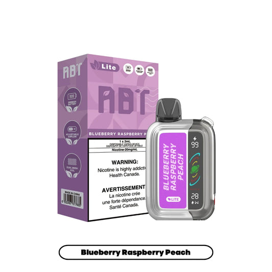 An ABT Lite disposable vape device in a silver and purple finish stands next to its matching purple packaging box, both labeled with the Blueberry Raspberry Peach flavor and featuring a digital display showing a 99 percent battery level and 28 watts.