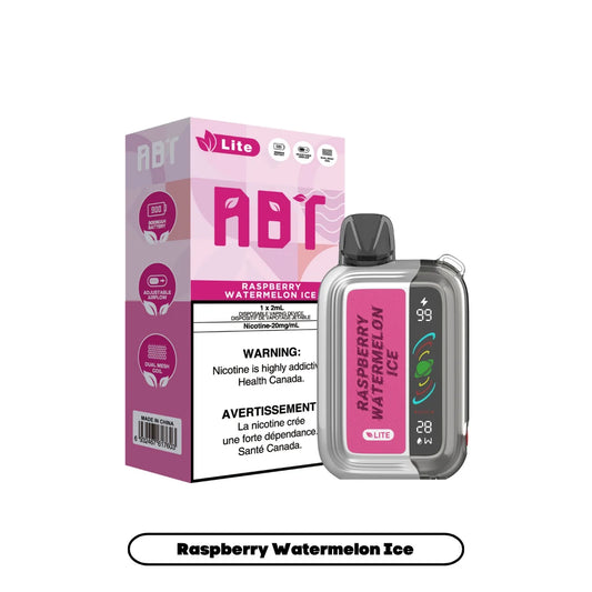 An ABT Lite disposable vape device in silver and pink sits next to its matching product box, which features a pink and white geometric design, the flavor name Raspberry Watermelon Ice, and a nicotine warning label.