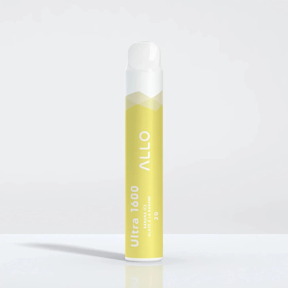 A yellow and white Allo Ultra 1600 Banana Ice disposable vape stands upright on a reflective white surface, featuring the text Allo, Ultra 1600, Banana Ice, Glace à la Banane, and 20.