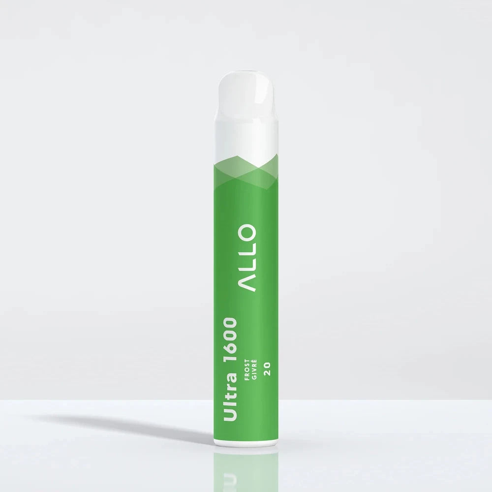 An Allo Ultra 1600 Frost disposable vape with a green cylindrical body and white mouthpiece, featuring the text Allo Ultra 1600 Frost Givré 20, standing on a reflective white surface.