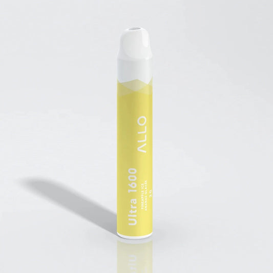 An ALLO Ultra 1600 Pineapple Ice disposable vape featuring a yellow cylindrical body with white text and a white mouthpiece, shown standing upright on a reflective white surface.