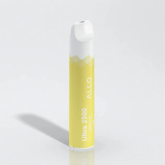 A yellow and white Allo Ultra 2500 Pineapple Ice disposable vape stands upright against a plain white background.