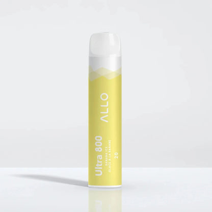 An Allo Ultra 800 Banana Ice disposable vape featuring a yellow and white cylindrical body with the text Allo, Ultra 800, Banana Ice, and Glace à la Banane.
