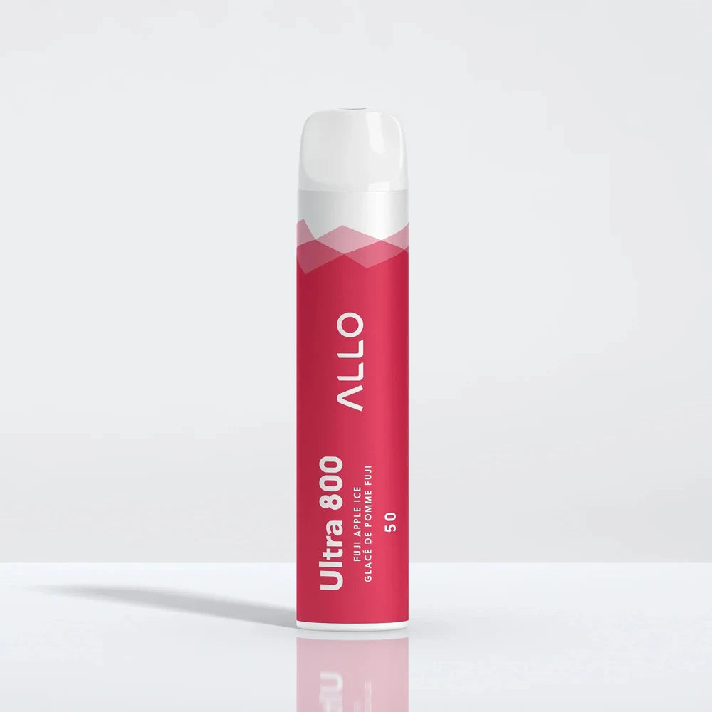 An Allo Ultra 800 Fuji Apple Ice disposable vape featuring a red cylindrical body with white text and a clear mouthpiece, standing upright on a reflective white surface.