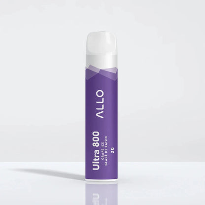 An Allo Ultra 800 Grape Ice disposable vape featuring a purple cylindrical body with a clear mouthpiece, labeled with Allo Ultra 800 Grape Ice Glacé De Raisin 20 text, standing on a reflective white surface.