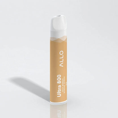 An Allo Ultra 800 Juicy Mango disposable vape featuring a yellow-orange body with a white mouthpiece and text reading Allo Ultra 800 Juicy Mango Mangue Juteuse.