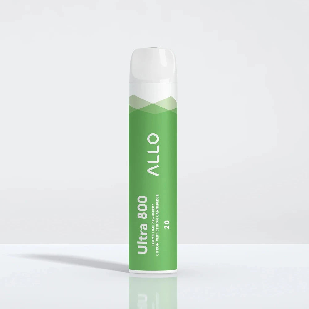 A green Allo Ultra 800 Lemon Lime Cranberry disposable vape with a white mouthpiece stands upright on a reflective white surface.