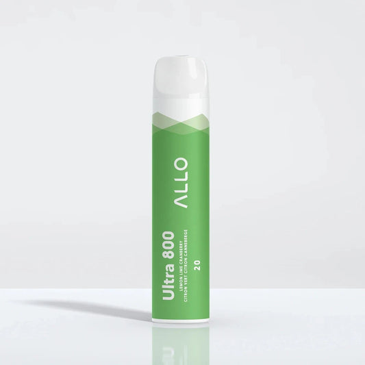 A green Allo Ultra 800 Lemon Lime Cranberry disposable vape with a white mouthpiece stands upright on a reflective white surface.