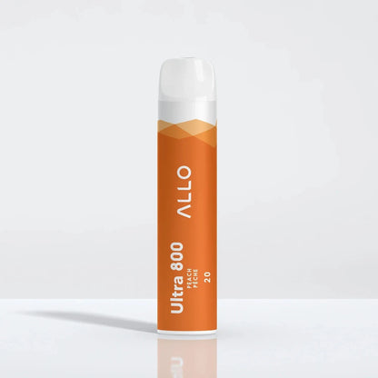 An Allo Ultra 800 Peach disposable vape with an orange body and white mouthpiece, featuring the text ALLO Ultra 800 Peach Pêche 20, shown on a reflective white surface.