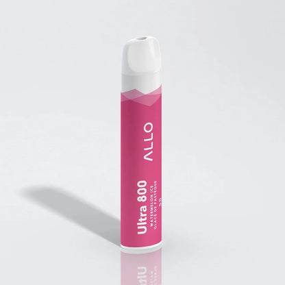 An Allo Ultra 800 Watermelon Ice disposable vape featuring a pink cylindrical body with a white mouthpiece and text reading Allo Ultra 800 Watermelon Ice Glacé de Pastèque.