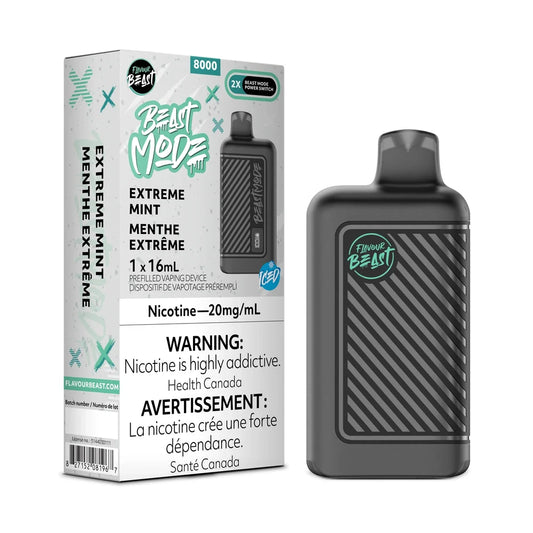 A Flavour Beast Mode 8K Extreme Mint disposable vape device stands next to its white and teal packaging, which displays the product name, a 20mg/mL nicotine warning, and a 16mL capacity label against a black background.
