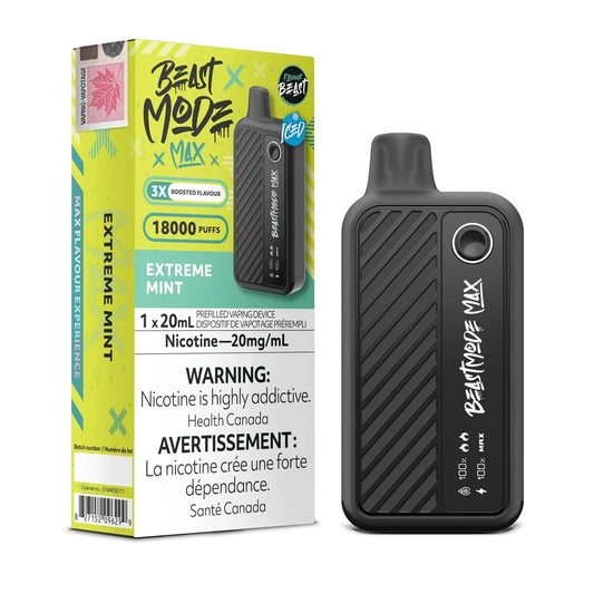 A Beast Mode Max 18K Extreme Mint disposable vape device stands next to its bright yellow and green packaging, which features the product name, a 18000 puff count, and bilingual health warnings.