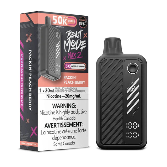 A black Beast Mode Max 2 disposable vape device stands next to its matching product packaging, which features a peach and berry color scheme, a 20mg/mL nicotine warning, and text indicating a 50,000 puff capacity in eco mode.