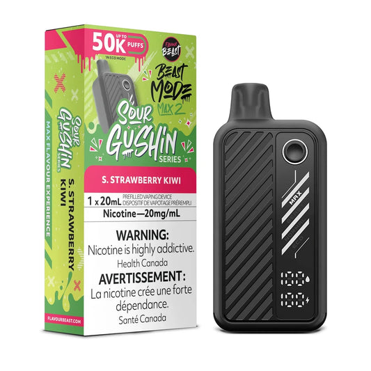 A Beast Mode Max 2 50k disposable vape in black sits next to its green and pink packaging box labeled S. Strawberry Kiwi, featuring a digital display showing 100 percent for both liquid and battery levels.