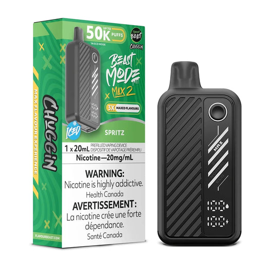 A black Beast Mode Max 2 disposable vape device stands next to its green and black retail packaging, which features the text Spritz, 50K Puffs, and a nicotine warning label.