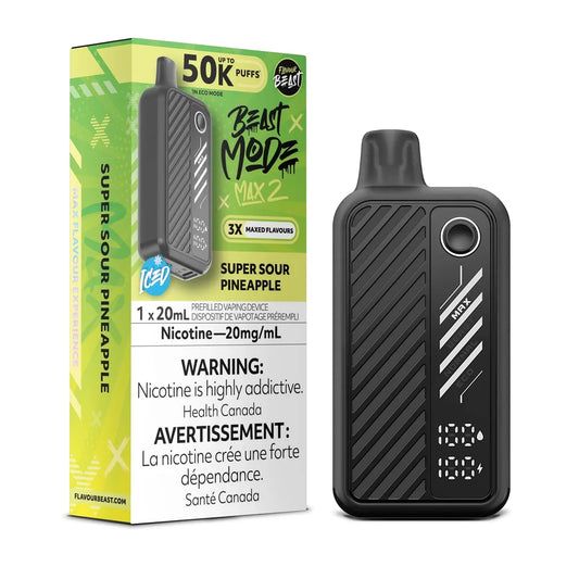 A Flavour Beast Mode Max 2 disposable vape in black sits next to its lime green and black packaging, both labeled Super Sour Pineapple Iced with a 20mg/mL nicotine concentration and a 50K puff capacity.