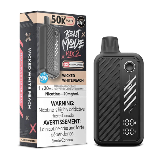 A Flavour Beast Mode Max 2 disposable vape in Wicked White Peach flavor stands next to its black and tan packaging, featuring a digital display on the device and clear labels indicating 20mg/mL nicotine strength and 50,000 puff capacity.