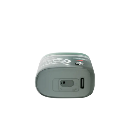 Bottom view of an ELFBAR BC Pro 80K Kiwi Guava Ice disposable vape showing the USB-C charging port and airflow intake on a light green and grey translucent body.