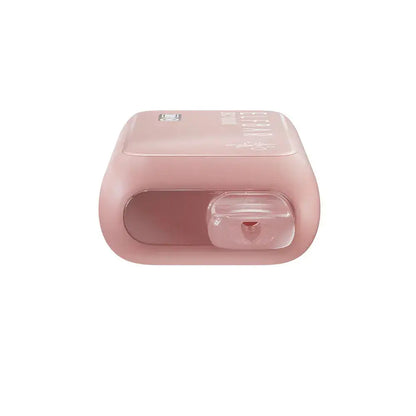 Top-down view of a light pink ELFBAR BC10000 Peach Ice disposable vape featuring a clear plastic mouthpiece and a matte finish body.