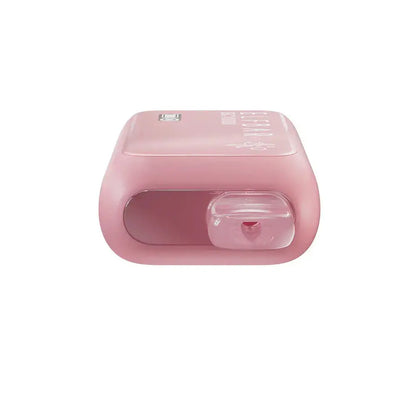 Top-down view of a pink ELFBAR BC10000 Strawberry Ice disposable vape showing the clear mouthpiece and the ELFBAR BC10000 branding on the smooth matte surface.