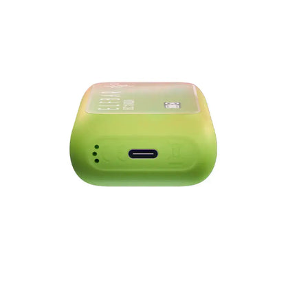 Bottom view of a lime green ELFBAR BC10000 Strawberry Kiwi Ice disposable vape showing the USB-C charging port and airflow holes against a white background.