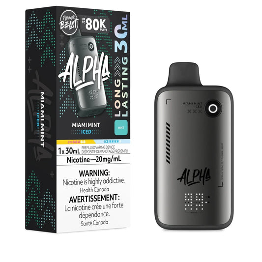 A Flavour Beast Alpha 80k Miami Mint disposable vape device stands next to its black and teal rectangular packaging, both featuring the product name, a 30mL capacity label, and a nicotine warning in English and French.