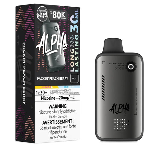 A Flavour Beast Alpha 80k disposable vape device in a metallic grey finish stands next to its black retail box, which features pink and orange geometric patterns and displays the Packin' Peach Berry flavor name, 30mL capacity, and 20mg/mL nicotine warning text.