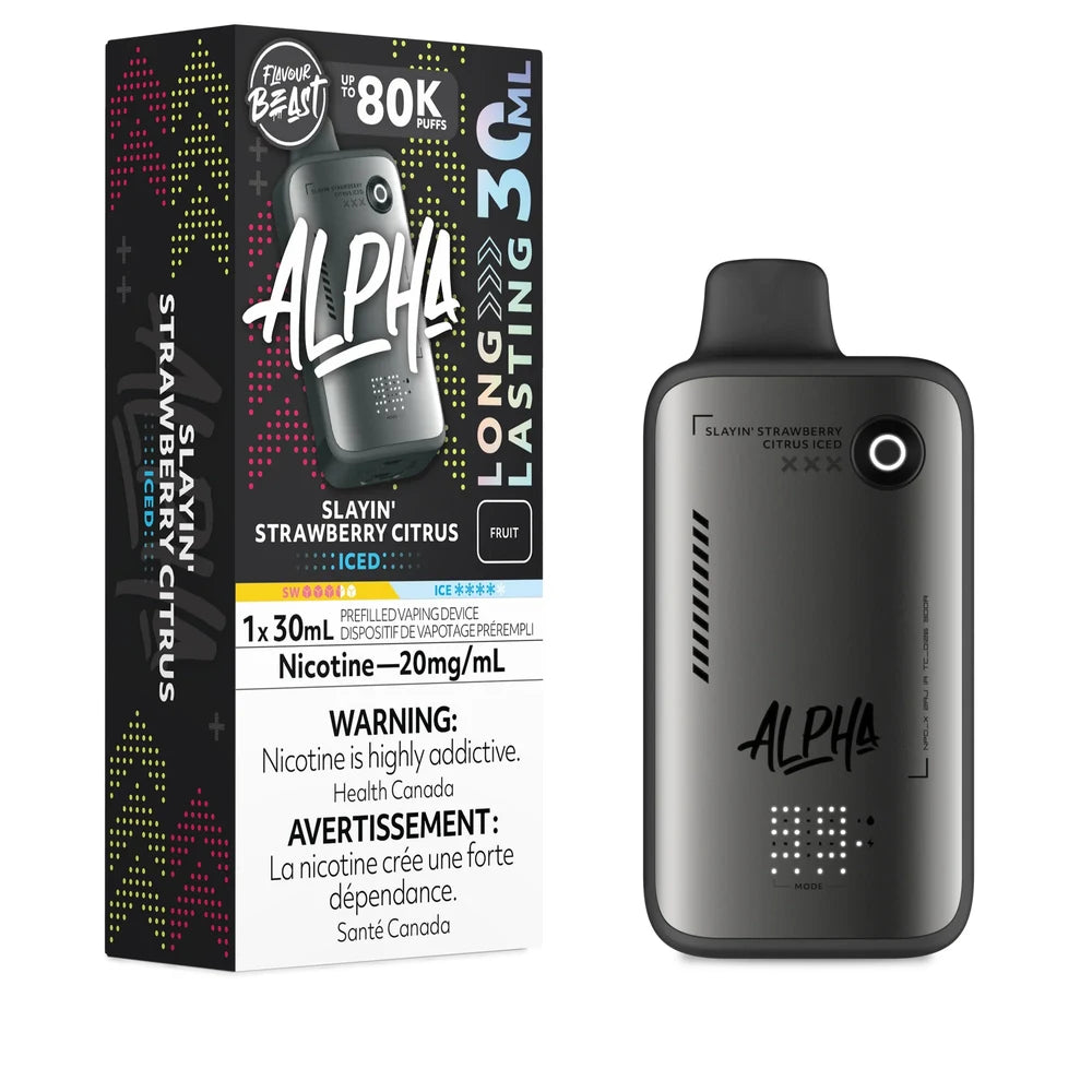 A Flavour Beast Alpha 80k disposable vape device in matte grey stands next to its black retail box featuring the Slayin' Strawberry Citrus Iced flavor name, 20mg/mL nicotine strength, and 30mL capacity labeling.