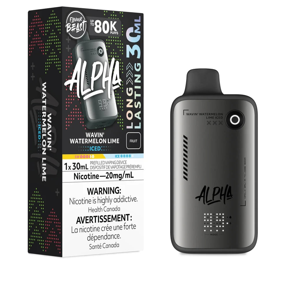 A Flavour Beast Alpha 80k disposable vape device in matte grey sits next to its vertical black packaging box, both featuring Wavin' Watermelon Lime Iced branding and a 20mg/mL nicotine warning label.