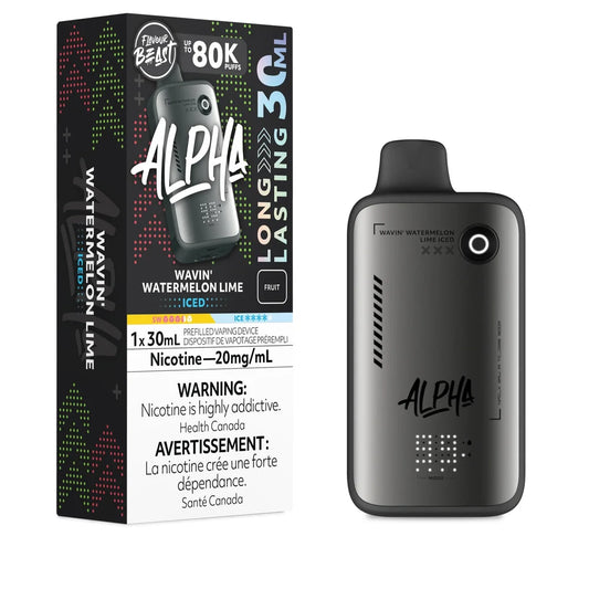 A Flavour Beast Alpha 80k disposable vape device in matte grey sits next to its vertical black packaging box, both featuring Wavin' Watermelon Lime Iced branding and a 20mg/mL nicotine warning label.