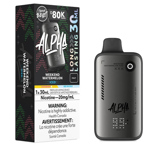 A Flavour Beast Alpha 80k Weekend Watermelon Iced disposable vape device stands next to its black and green packaging, which displays the product name, a 30mL capacity, and a mandatory nicotine warning in English and French.