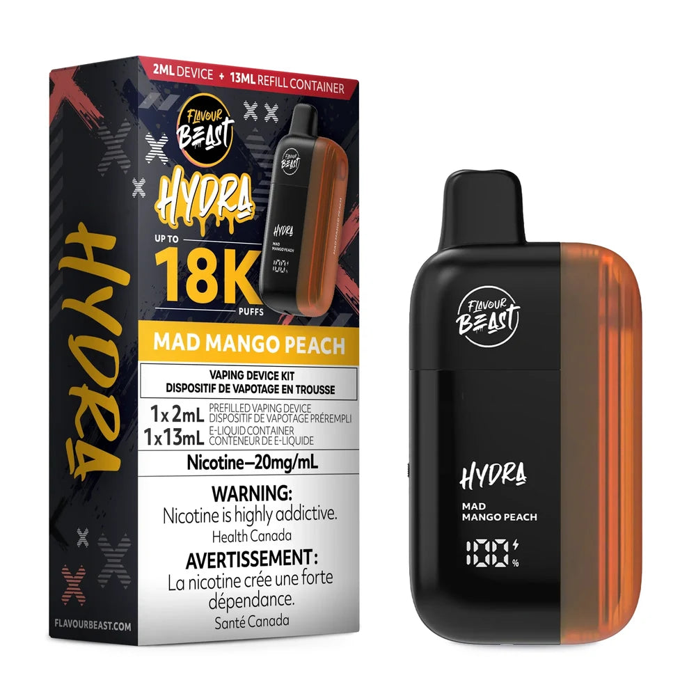 A Flavour Beast Hydra Mad Mango Peach disposable vape kit featuring a black and orange device next to its product packaging, which displays the 18K puff count, 20mg/mL nicotine strength, and a 13mL refill container.