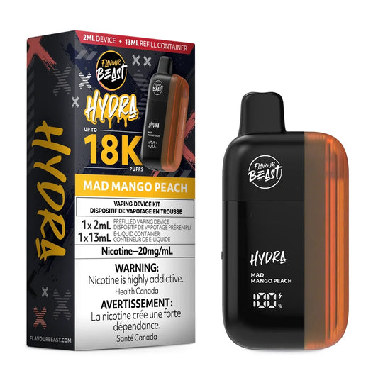 A Flavour Beast Hydra Mad Mango Peach disposable vape kit featuring a black and orange device next to its product packaging, which displays the 18K puff count, 20mg/mL nicotine strength, and a 13mL refill container.