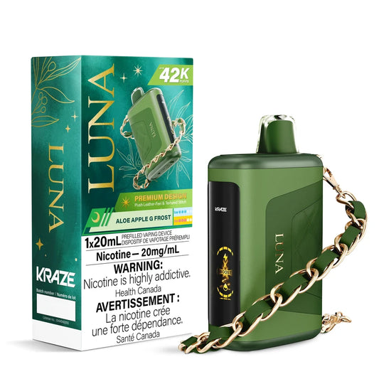Kraze Luna Aloe Apple G Frost disposable vape device with a green leather-textured finish and gold chain strap, shown next to its matching teal and gold packaging.