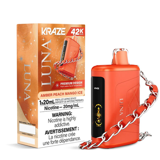 Kraze Luna Amber Peach Mango Ice disposable vape featuring an orange leather-textured device with a silver chain lanyard next to its matching orange and white packaging.