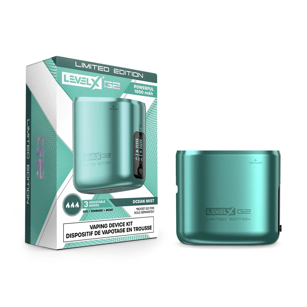 The Level X Boost G2 device kit in Ocean Mist is displayed next to its teal-colored packaging, featuring a metallic finish, a digital display screen, and the Level X G2 Limited Edition branding on both the device and the box.