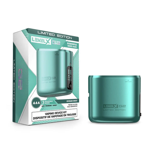 The Level X Boost G2 device kit in Ocean Mist is displayed next to its teal-colored packaging, featuring a metallic finish, a digital display screen, and the Level X G2 Limited Edition branding on both the device and the box.