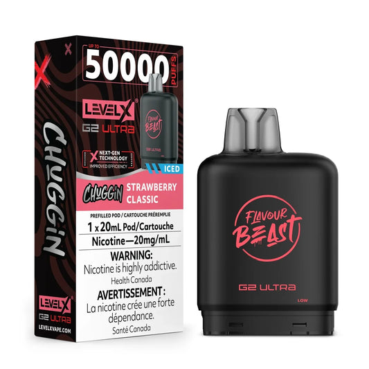 A Level X G2 Ultra Chuggin Strawberry Classic iced vape pod stands next to its black and pink product packaging, which features the Flavour Beast logo and highlights a 50,000 puff capacity and 20mg/mL nicotine content.