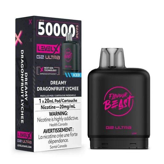 A Level X G2 Ultra Dreamy Dragonfruit Lychee iced vape pod stands next to its black and pink product packaging, which features the Flavour Beast logo and text indicating 50,000 puffs and a 20mg/mL nicotine concentration.