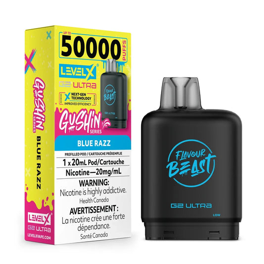 A Level X G2 Ultra Gushin Blue Razz vape pod stands next to its yellow and pink packaging, which features the Flavour Beast logo, 50,000 puff count, and Canadian nicotine warning labels.