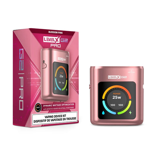 The Level X Pro G2 Device Kit in Blossom Pink is displayed next to its matching pink retail box, featuring a metallic rose-gold finish, a digital display screen showing 25W power, and branding that reads Level X G2 Pro.