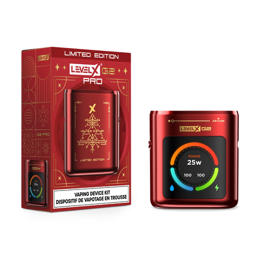 A red Level X Pro G2 vaping device kit is displayed next to its matching limited edition packaging, which features a gold geometric Christmas tree design and clear digital display showing 25W power and battery levels.