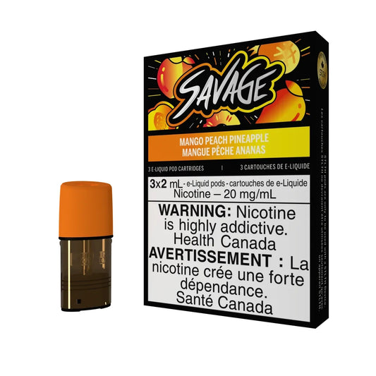 A single STLTH Savage Mango Peach Pineapple pod with an orange cap stands next to its black and yellow packaging featuring fruit illustrations and a nicotine warning label.