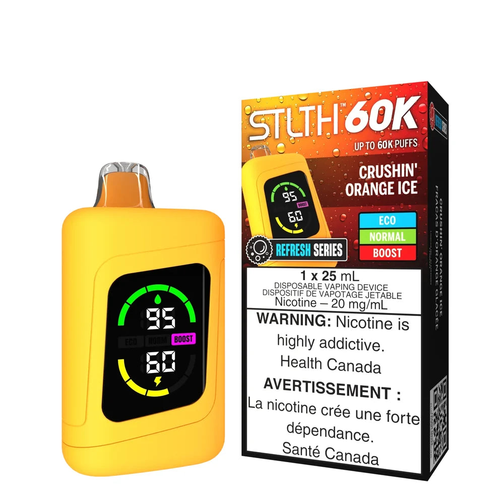 STLTH 60K Crushin' Orange Ice disposable vape featuring a yellow device with a digital display screen next to its orange and black packaging.