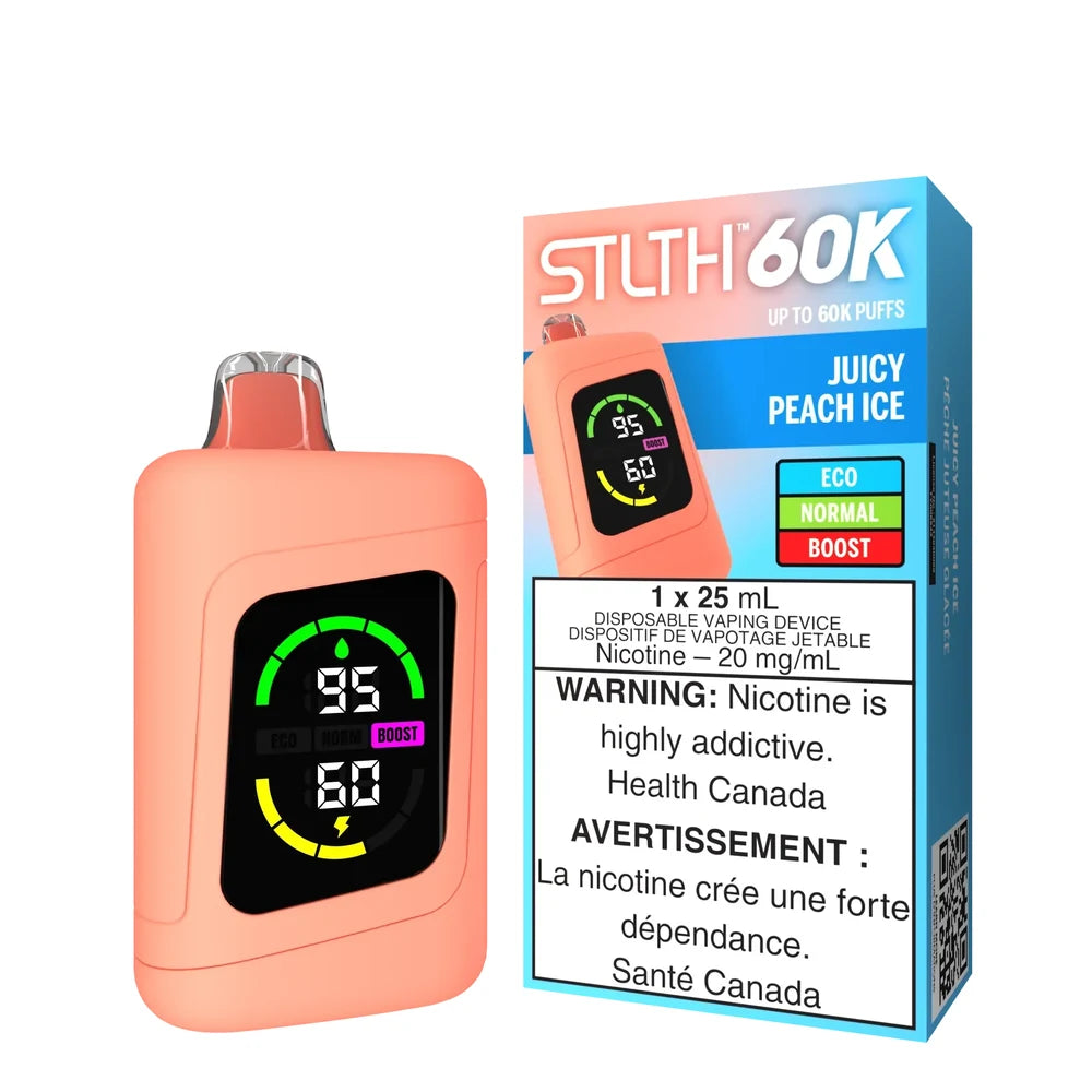 STLTH 60K Juicy Peach Ice disposable vape device in peach orange with a digital display screen showing battery and e-liquid levels, standing next to its blue and orange retail packaging.