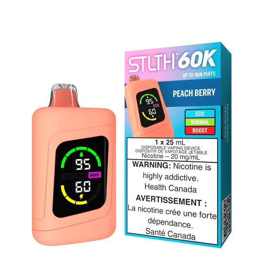 A peach-colored STLTH 60K Peach Berry disposable vape device featuring a digital display screen next to its blue and pink retail packaging.