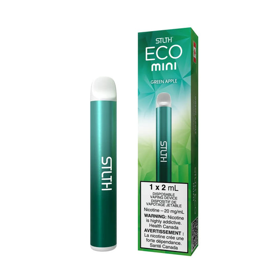 STLTH ECO MINI Green Apple disposable vape device with a metallic teal finish and white mouthpiece, shown next to its green geometric-patterned packaging.