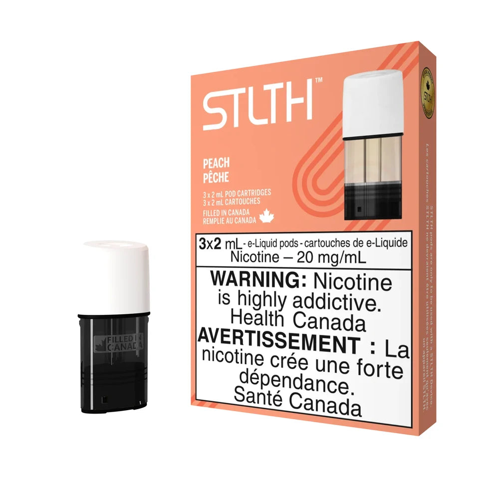 A peach-colored STLTH Peach pod pack box stands next to a single replacement e-liquid pod featuring a white mouthpiece and black base.