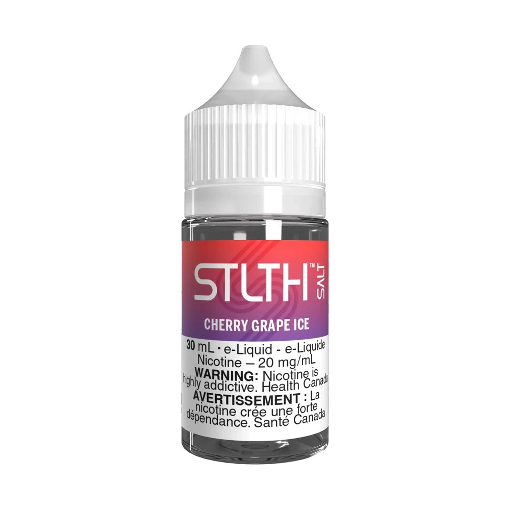A 30mL bottle of STLTH Salt Cherry Grape Ice e-liquid featuring a white child-resistant cap and a red and purple gradient label with a nicotine warning.
